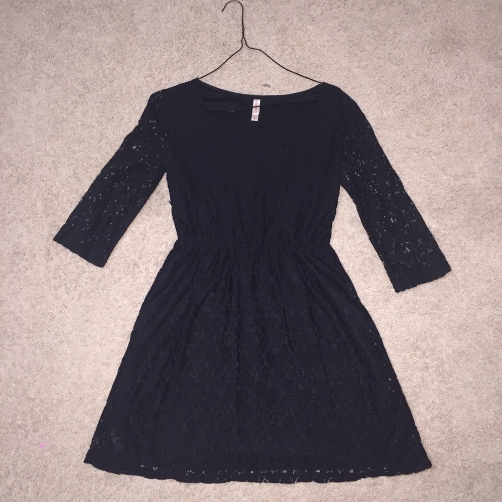 Classy little black lace dress.